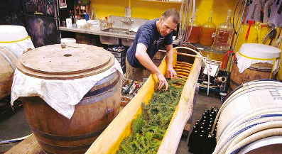 Paul Arney readies spruce tips at Bend's amazing The Ale Apothecary